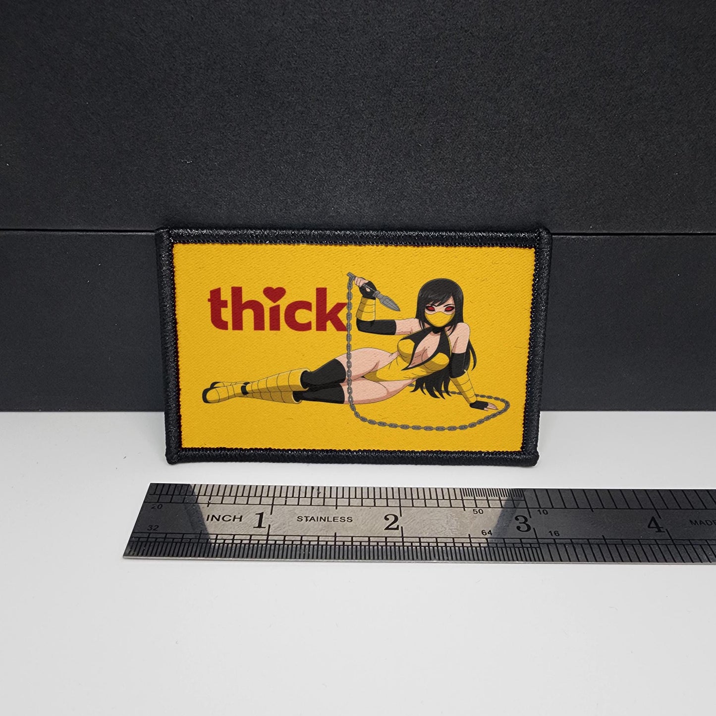 Thick Hearts – Scorpion Yellow Ninja - morale patch – sexy - anime - waifu - video game - 2x3 inch – hook and loop - iron-on – interchangeable patch hat