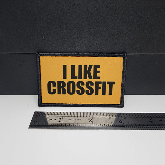 Yellow patch with 'I LIKE CROSSFIT' text on a black background, next to a ruler for scale.

CAPS LOCK ORIGINAL - morale patch - 2x3 inch – hook and loop - iron-on - interchangeable patch - hat - bag - sports