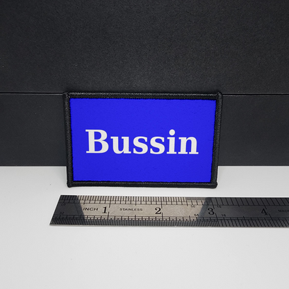 Blue patch with 'Bussin' text on a black background, next to a ruler for scale.

CAPS LOCK ORIGINAL - morale patch - 2x3 inch – hook and loop - iron-on - interchangeable patch - hat - bag